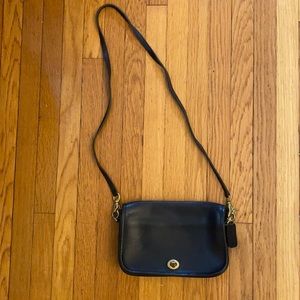 Black thick leather authentic vintage coach bag.